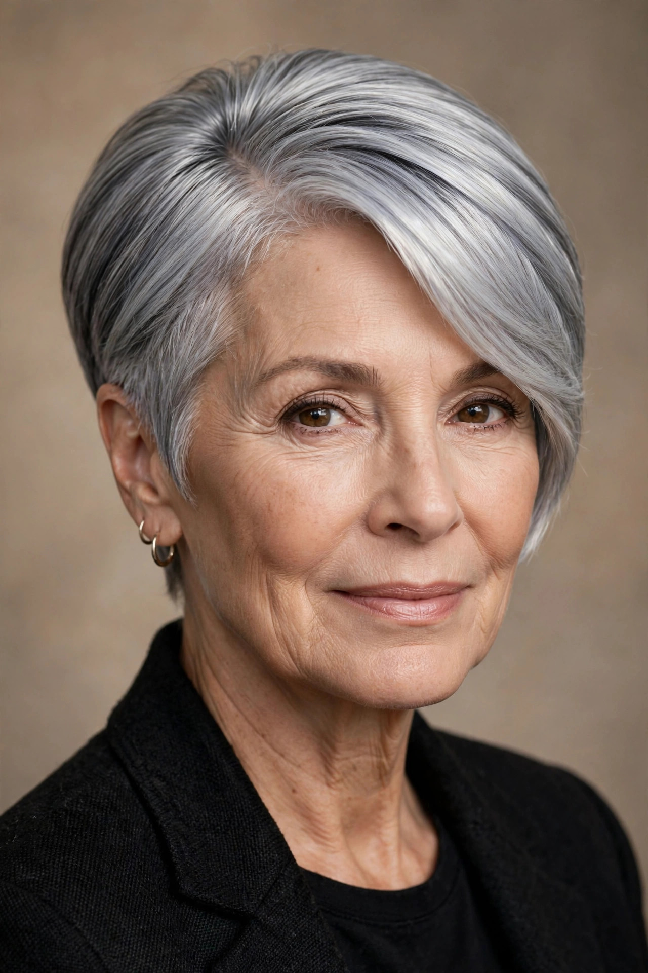 Sleek side-parted pixie in luminous silver gray